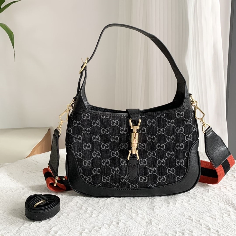 G*u*i top handle bags